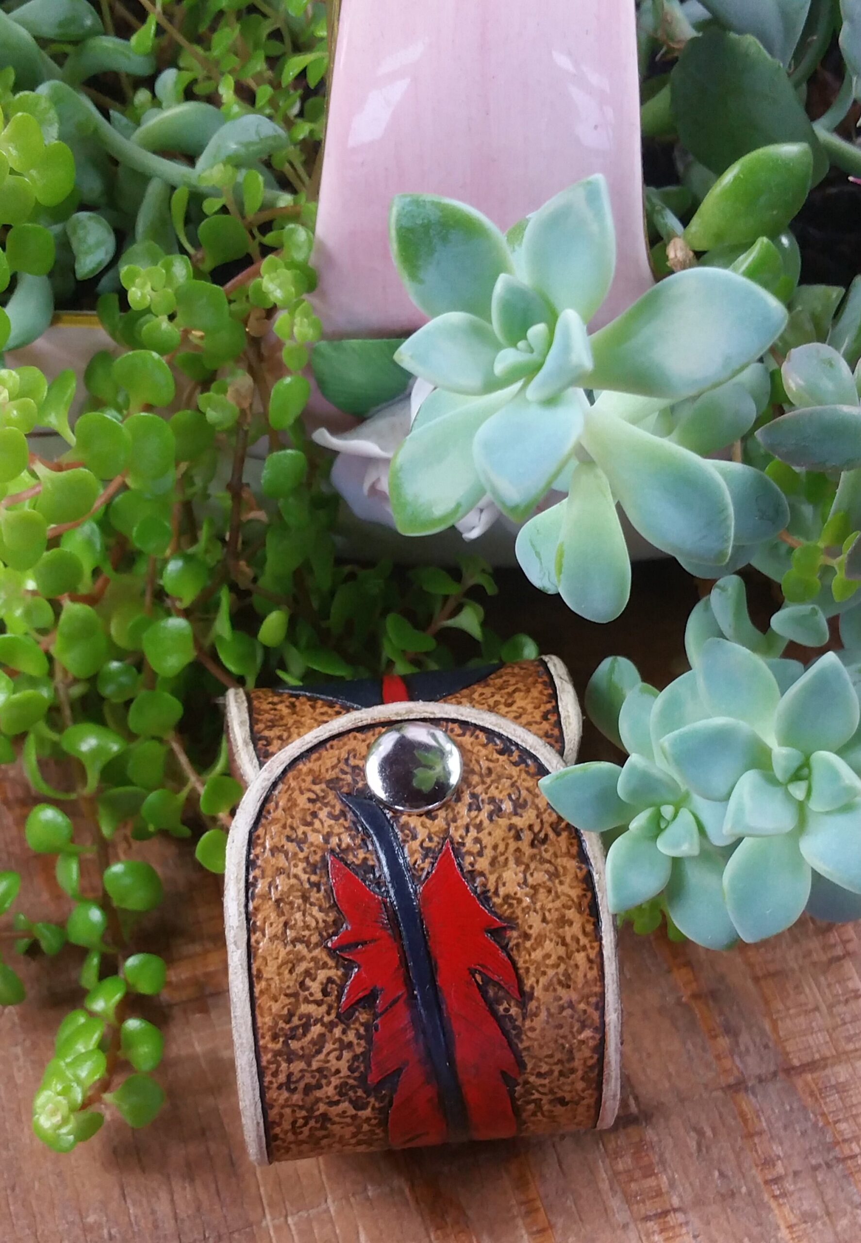 Hand tooled cowhide leather feather bracelet in red, blue and white - Image 3