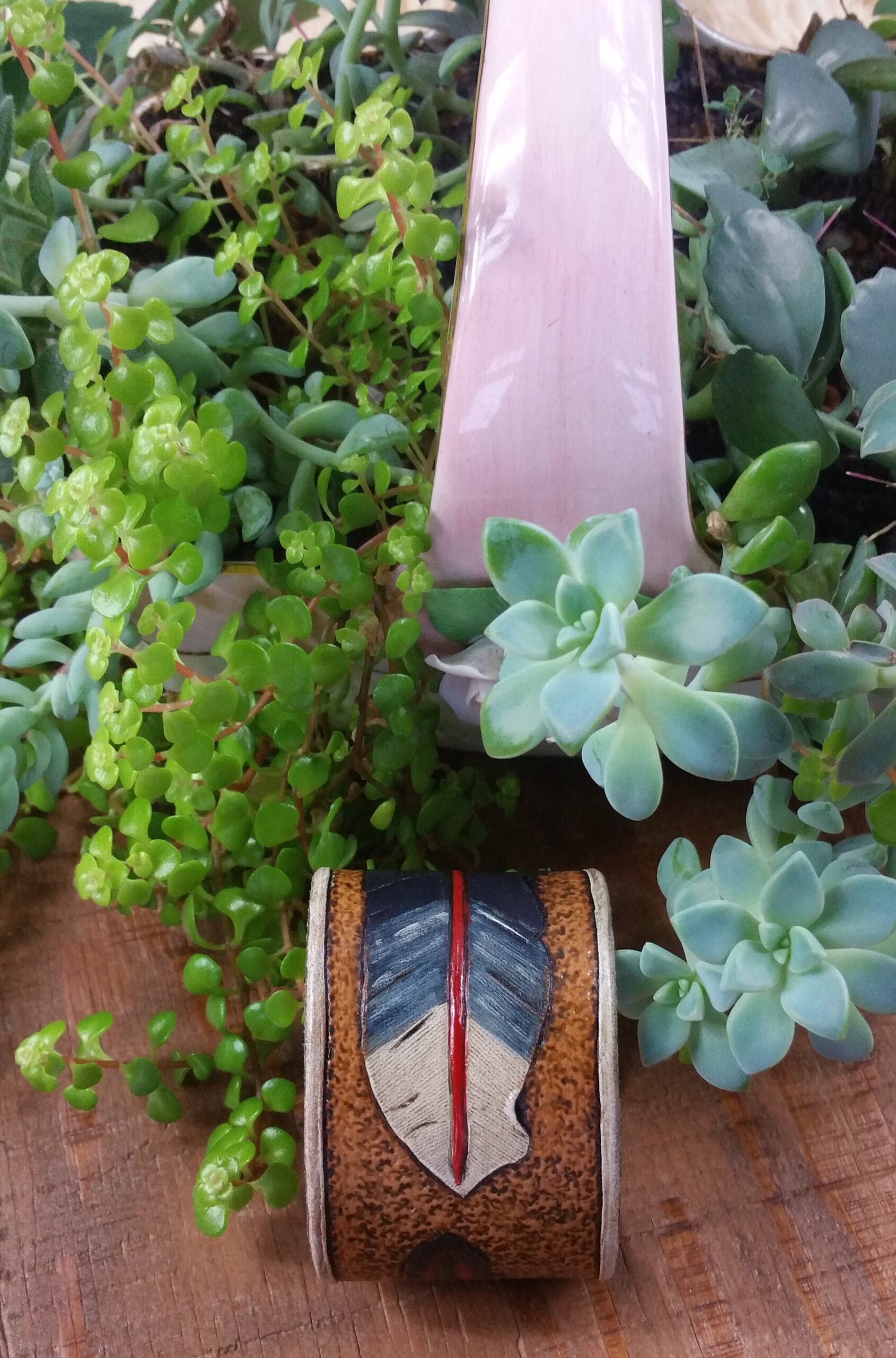 Hand tooled cowhide leather feather bracelet in red, blue and white - Image 2