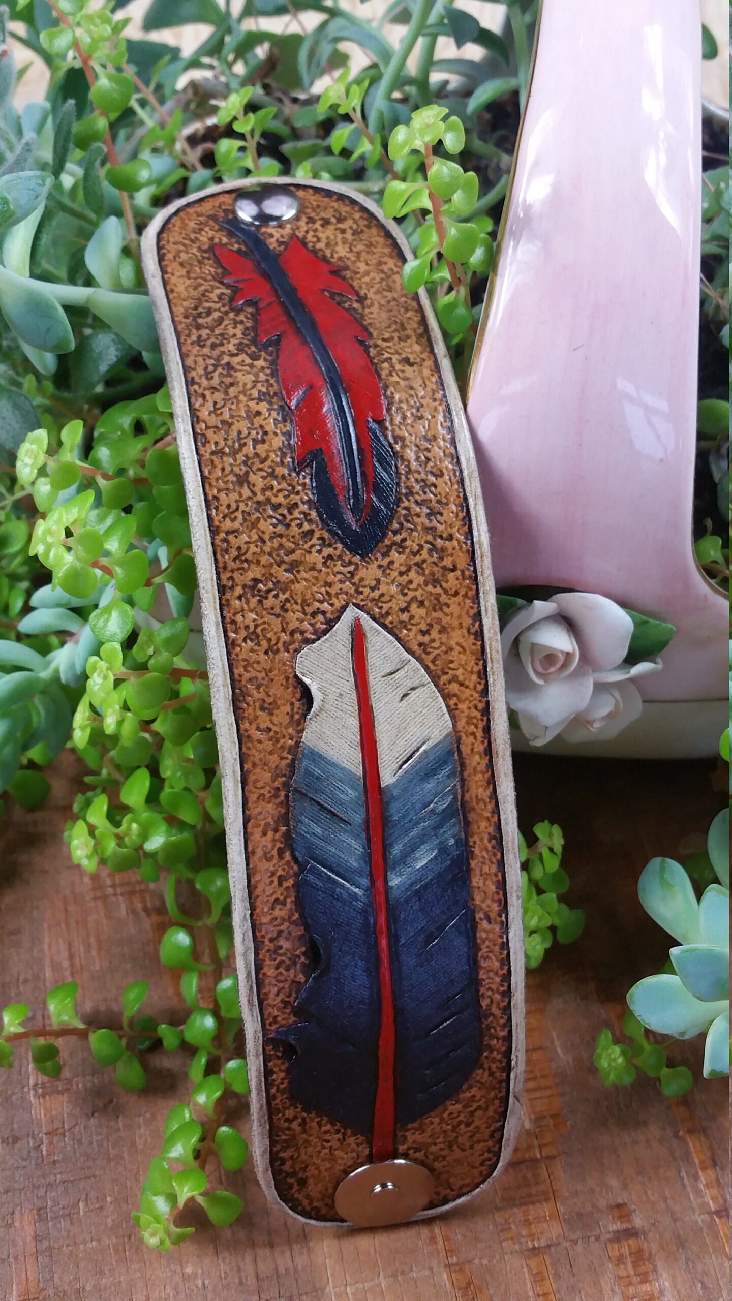 Hand tooled cowhide leather feather bracelet in red, blue and white - Image 7